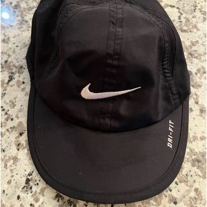 Nike Dri Fit one size fits all velcro strapped hat.
